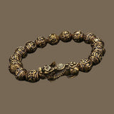 Bracelet porte bonheur avec des perles portant des inscriptions de mantras et Pi Yao/PiXiu Feng ShuiPi Yao